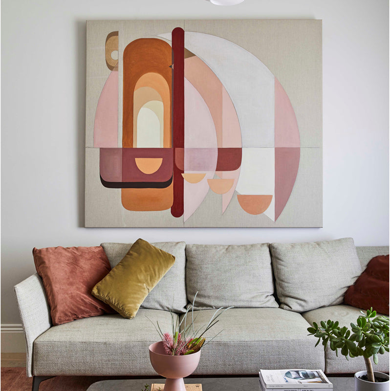 Abstract wall art above sofa showing correct artwork size