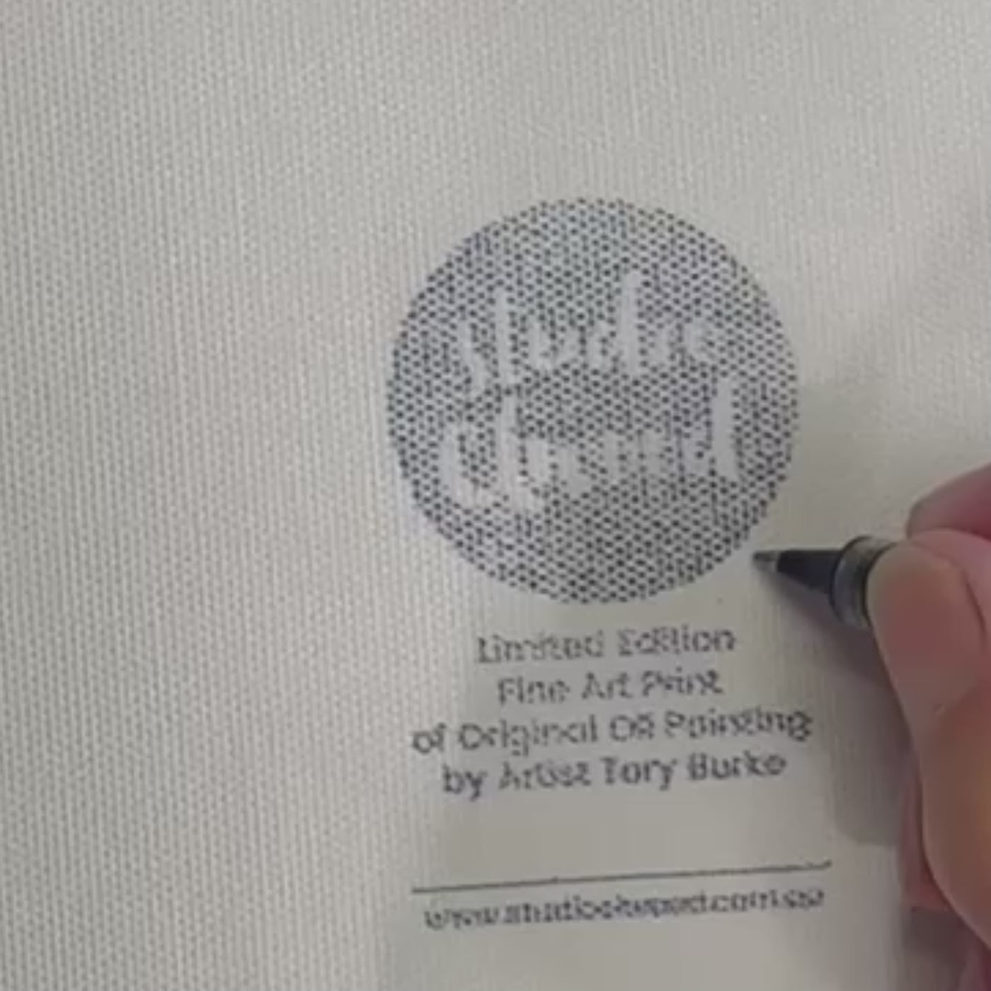 Load video: Signing limited edition artworks